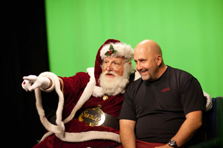 Visitors could get a holiday photo with Santa in either the North Pole or a tropical getaway using the studio’s green screen.