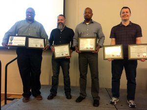 Pictured l-r: Emanuel Brunson, Arthur Earnest, Shawn Colvin and Jonathan Champ receive certificates at May 24 Pathways Leadership Development program graduation.
