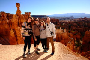 Jill and her family pose at Bryce Canyon National Park in Utah
