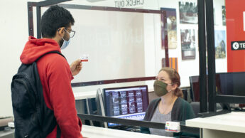 Image of student checking in at the Centennial Campus Test Center.