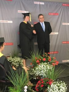 Ammons at her graduation from the program with her advisor, Anthony LeBude.