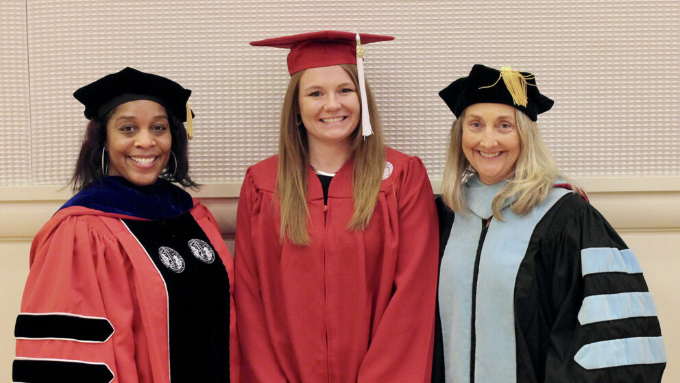 Program Advisor LaShica Waters, Ph.D, Erin McHugh and Teaching Assistant Professor Tracy Appling on graduation day in December of 2021.