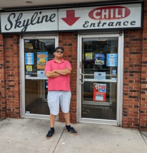 Brandon Pope standing in front of Skyline Chili in Cincinnati, Ohio.