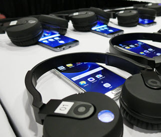 Headphones laying over a smartphone.